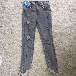 Grey ripped skinny jeans